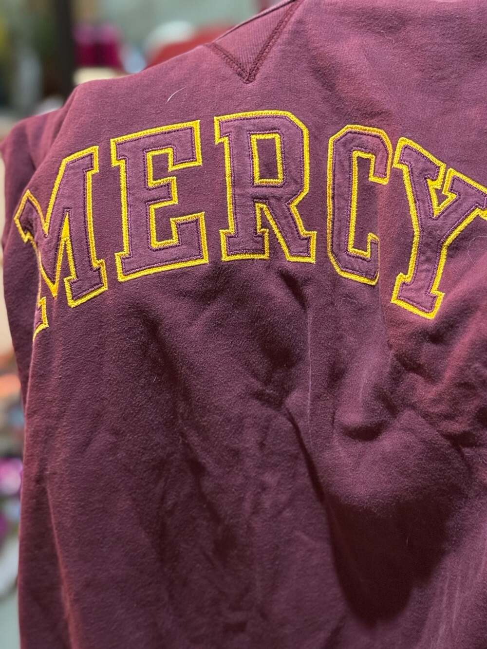 League Collegiate Outfitters Mercy Embroidered Maroon Crewneck Sweatshirt